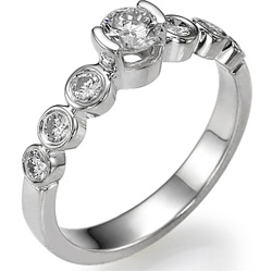 Half bezel engagement ring with side bezel set